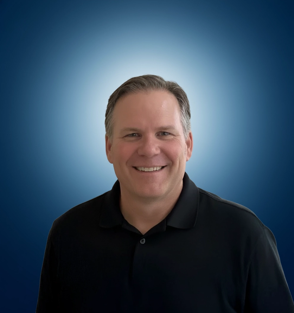 Team Member Matt on a photo studio blue background